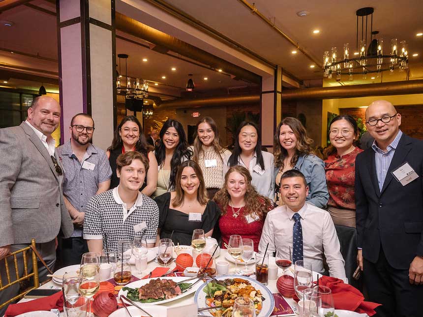 guests sitting around banquet table at gala event